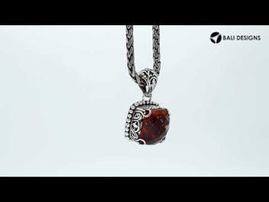 Sterling silver pendant with cushion-cut citrine quartz, Balinese handcrafted with ornate detailing and oxidized finish.