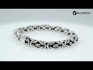 Wholesale sterling silver bracelet featuring a bold 7MM Balinese woven chain with oxidized accents and a secure lobster lock designed for premium bulk catalogs.