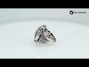 Wholesale sterling silver Balinese statement ring with ornate floral medallion design, oxidized detailing, and handcrafted scroll patterns – artisan jewelry from Bali.