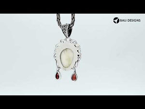 Sterling Silver Garnet Quartz Bone Face Pendant With Ornate Balinese Filigree.