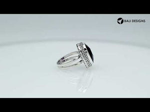 Wholesale sterling silver ring with faceted oval Amethyst Quartz, Balinese beaded border design – bulk handcrafted statement jewelry.