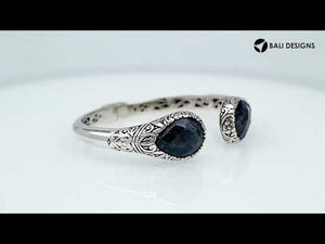 Wholesale sterling silver Bali engraved hinge cuff bracelet featuring sapphire quartz ends and polished–oxidized detailing, crafted to meet premium bulk jewelry inventory standards.