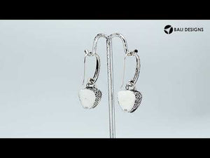 Wholesale sterling silver earrings featuring a faceted triangular Mystic Quartz stone framed with intricate carved patterns and earwire lock, designed to offer bold artisanal style for premium wholesale jewelry catalogs.