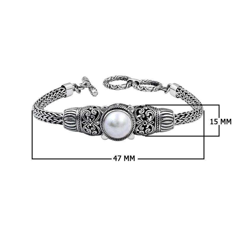 Sterling silver Balinese bracelet with pearl centerpiece and oxidized handcrafted detailing