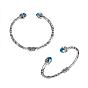 Wholesale sterling silver Blue Topaz Quartz bangle with twisted rope design and Balinese motifs, handcrafted in Bali.