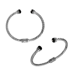 Wholesale sterling silver Black Onyx bangle with twisted rope design, Balinese motifs, and oxidized finish, handcrafted in Bali.