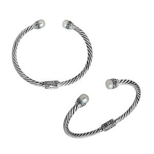 Wholesale sterling silver Pearl bangle with twisted rope design, Balinese motifs, and oxidized finish, handcrafted in Bali.