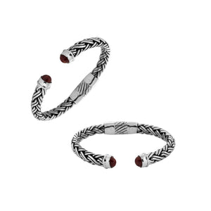 Sterling silver braided bangle with Coral ends handcrafted in Bali for wholesale jewelry collections.