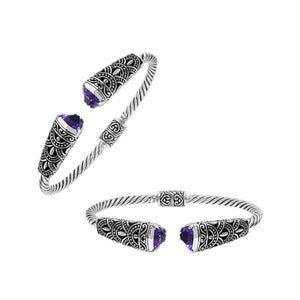 Sterling silver twisted bangle with amethyst quartz ends and oxidized Balinese design