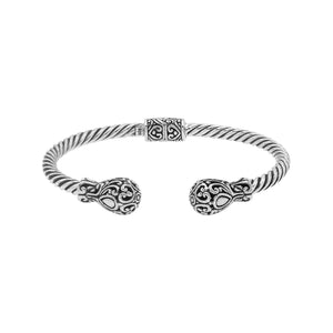 Sterling silver twisted bangle with ornate Balinese end design and oxidized finish