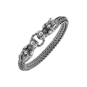 Sterling silver double dragon head bracelet with woven chain and oxidized finish