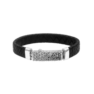 Sterling silver and black leather bracelet with ornate Balinese clasp and oxidized finish