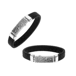 Sterling silver and black leather bracelet with ornate Balinese clasp and oxidized finish
