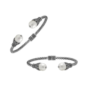 925 Sterling Silver Balinese Twisted Bangle With Shell Pearl And Hinge Lock On White Background