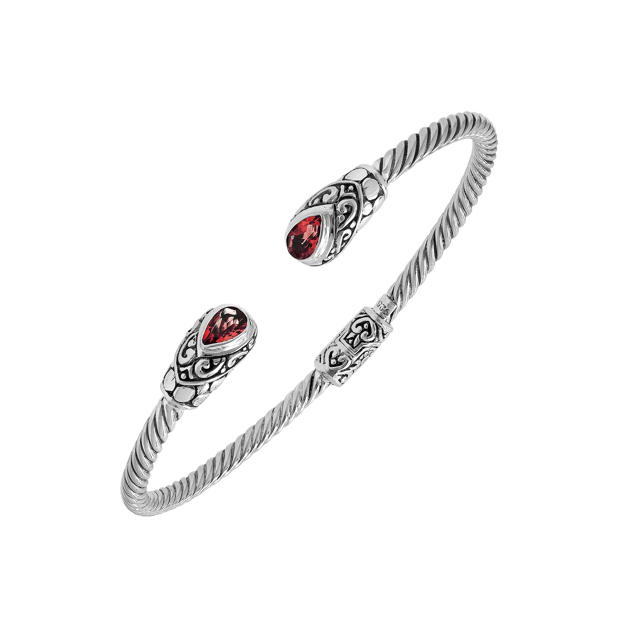 Silver twisted cable bangle in 925 sterling silver with pear-shaped Garnet Quartz and Balinese scroll engraving.