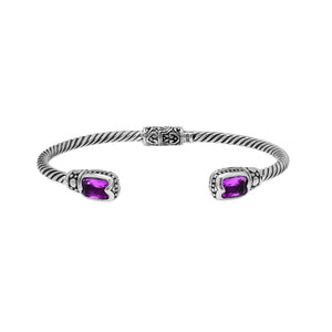 Silver twisted cable bangle in 925 sterling silver with Amethyst Quartz ends and Balinese engraving.