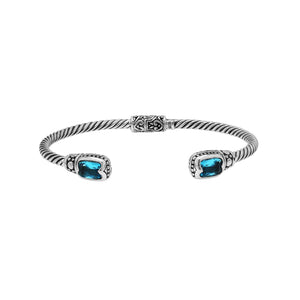 Silver twisted cable bangle in 925 sterling silver with Blue Topaz Quartz and ornate Balinese engraving.