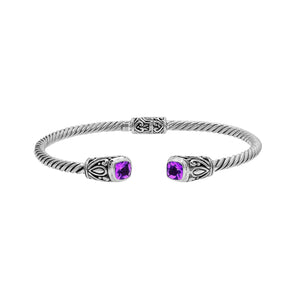 Silver twisted cable bangle in 925 sterling silver with Amethyst Quartz ends and Balinese engraving.