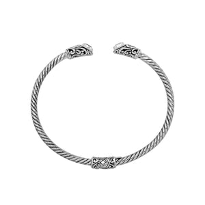 Silver twisted cable bangle in 925 sterling silver with Amethyst Quartz ends and Balinese engraving.