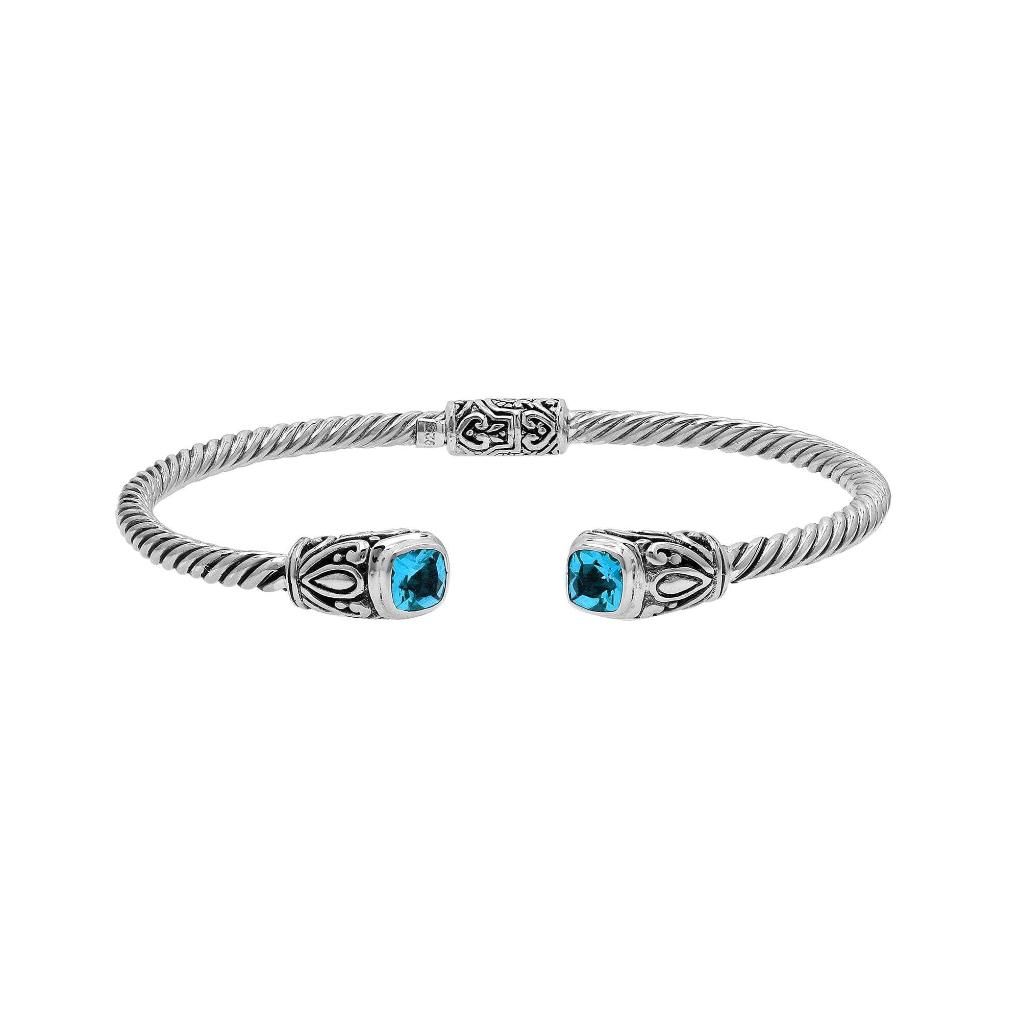 Silver twisted cable bangle in 925 sterling silver with Blue Topaz Quartz ends and Balinese engraving.