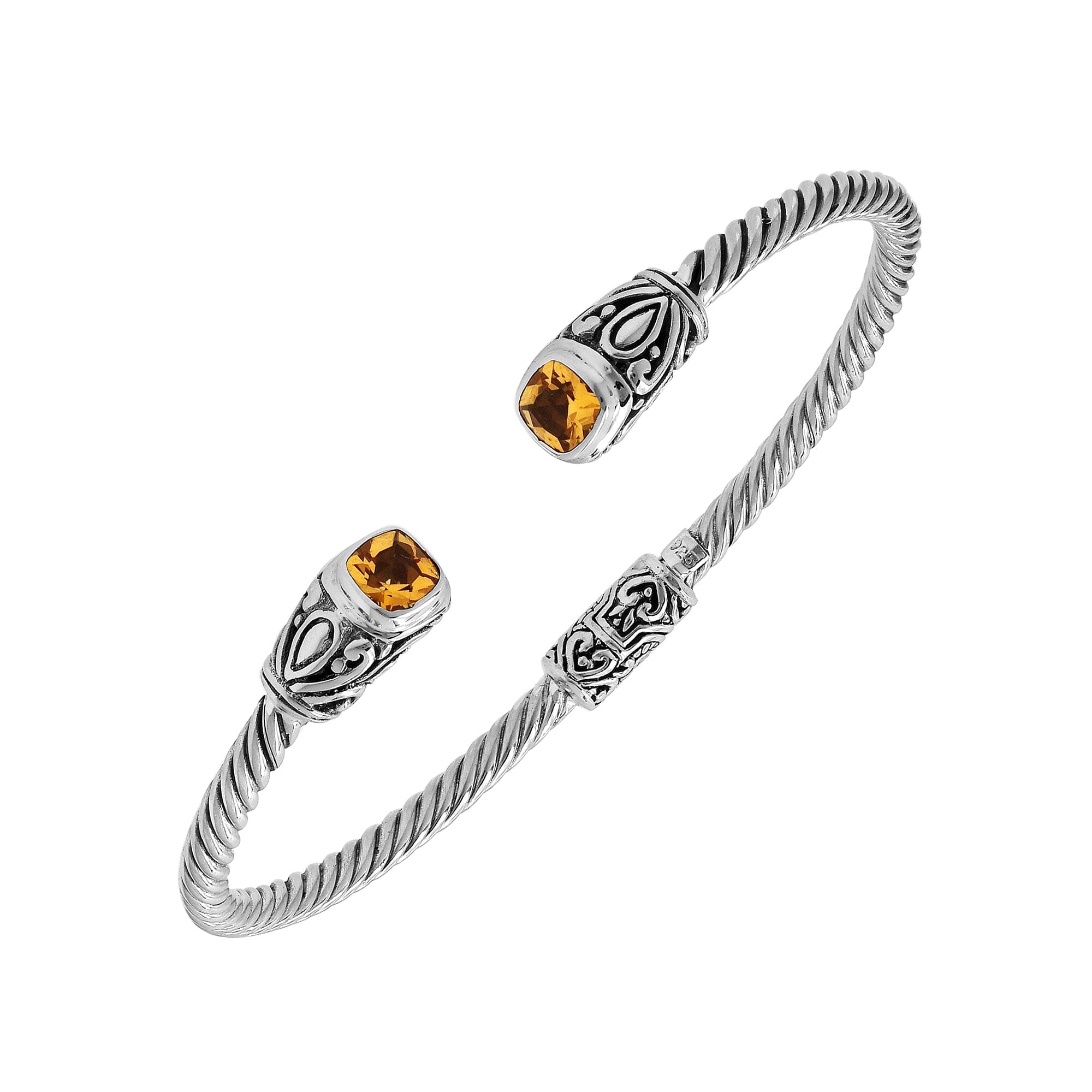 Silver twisted cable bangle in 925 sterling silver with Citrine Quartz ends and Balinese engraving.