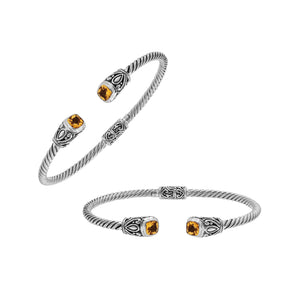 Silver twisted cable bangle in 925 sterling silver with Citrine Quartz ends and Balinese engraving.