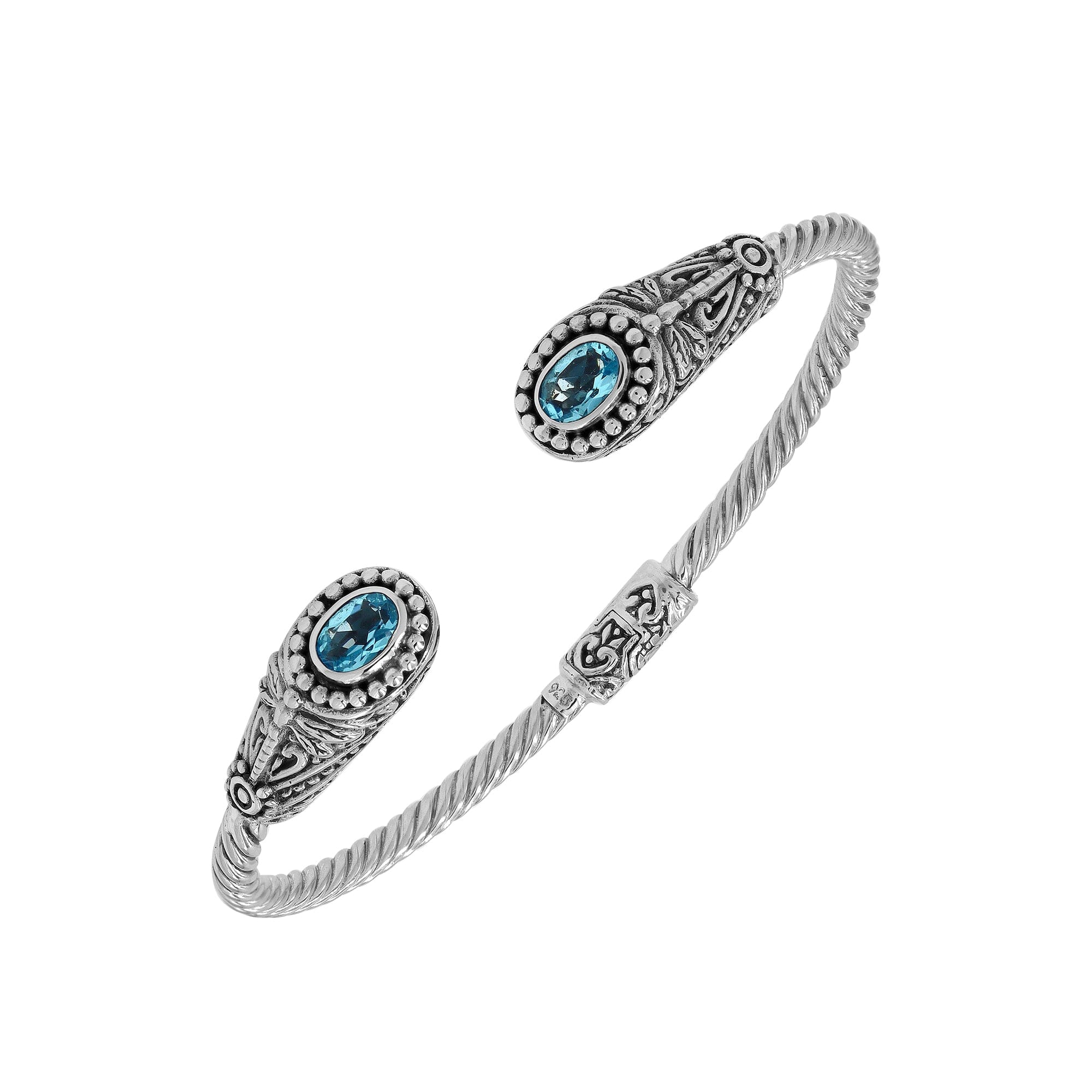 Silver twisted cable bangle in 925 sterling silver with Blue Topaz Quartz ends and Balinese engraving.