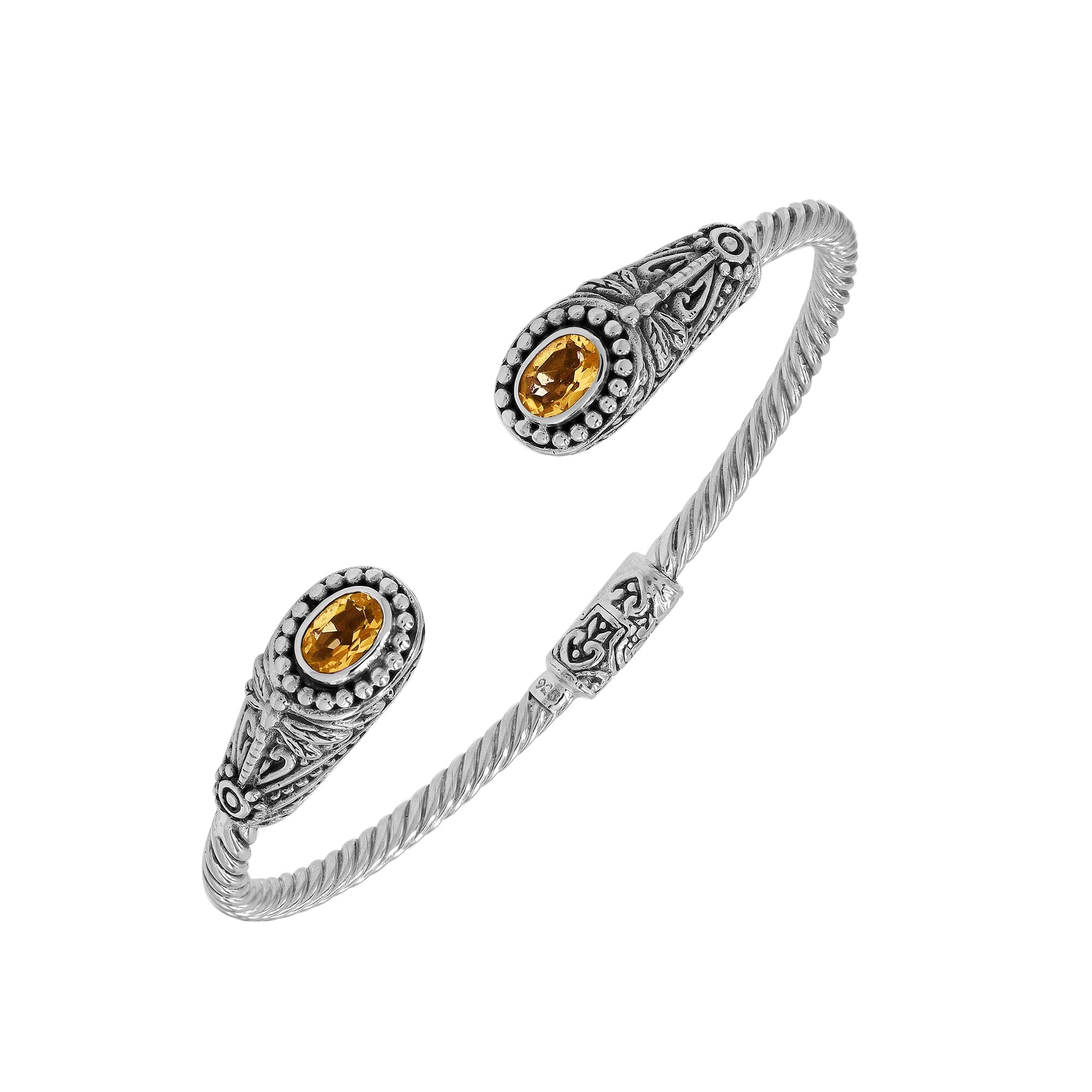 Silver twisted cable bangle in 925 sterling silver with Citrine Quartz ends and Balinese engraving.