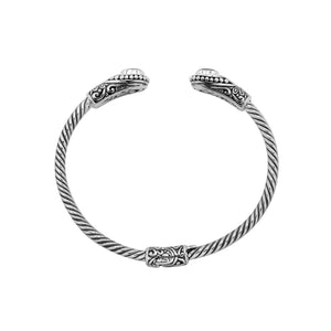 Silver twisted cable bangle in 925 sterling silver with Amethyst Quartz ends and Balinese engraving.