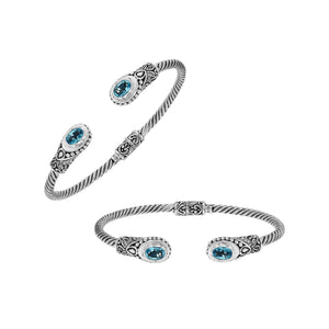 925 sterling silver cable bangle with Blue Topaz Quartz stones and hand-engraved Balinese detailing.