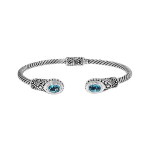 925 sterling silver cable bangle with Blue Topaz Quartz stones and hand-engraved Balinese detailing.