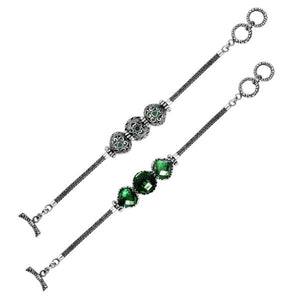 Wholesale sterling silver bracelet featuring three cushion Green Quartz stones set in detailed Balinese frames with woven chain segments and a secure toggle lock for catalog-ready use.