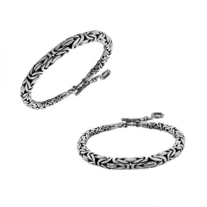 Wholesale sterling silver bracelet featuring a bold 8MM round braided chain with polished detailing, oxidized depth, and a secure toggle lock ideal for catalog and bulk orders.