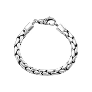 Wholesale sterling silver bracelet featuring a bold 4MM flat-weave chain with polished and oxidized accents and a secure lobster lock.