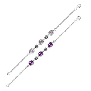 Wholesale sterling silver bracelet featuring cushion-cut Amethyst quartz stones with decorative silver links, a 2.5MM chain design, and a secure lobster lock closure.