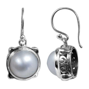 Wholesale sterling silver earrings with round white pearl and Bali-style handcrafted design.