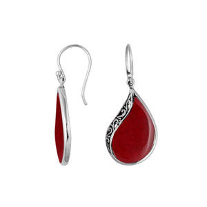 Wholesale sterling silver teardrop earrings with bold red coral inlay and Balinese scroll detailing, handcrafted in Bali