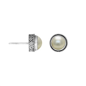 Sterling silver stud earrings with White Pearls and Balinese swirl detailing.