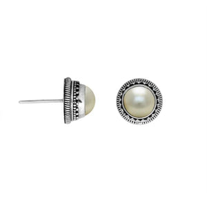Sterling silver stud earrings with White Pearls and a dotted Balinese border.