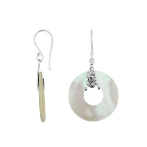 A pair of 925 sterling silver earrings featuring round open Mother Of Pearl drops with Balinese filigree accents and an elegant earwire lock design.