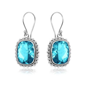 Silver earrings with faceted rectangular Blue Topaz Quartz and beaded edging
