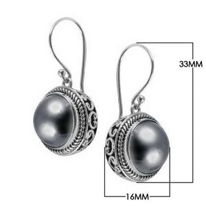 Wholesale sterling silver Grey Mabe Pearl earrings with structured frame and earwire lock.