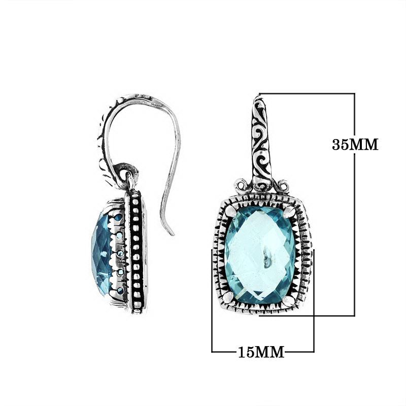 Wholesale sterling silver earrings with rectangular Blue Topaz Quartz and handcrafted metal details.