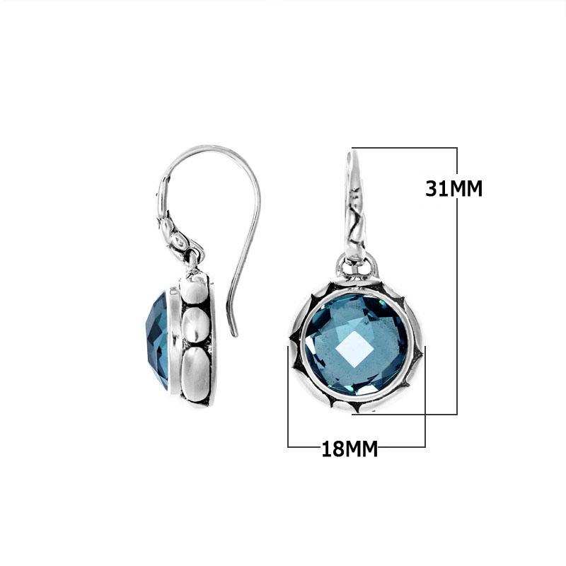Wholesale sterling silver earrings with round Blue Topaz Quartz and sculpted metal detailing.