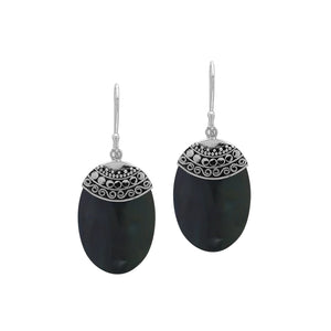 Wholesale sterling silver earrings featuring Black Shell ovals with an ornate patterned silver cap.