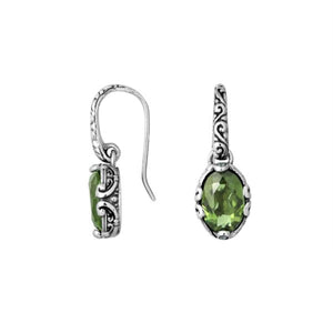 Wholesale sterling silver earrings with oval Green Amethyst Quartz and ornate scroll-accent frames.