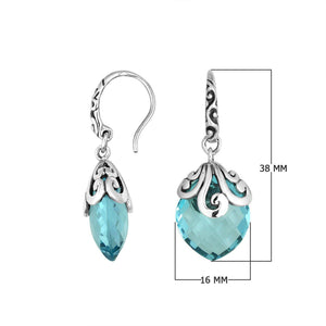 Sterling silver Blue Topaz Quartz earrings with faceted teardrop design and ornate silver scrollwork for wholesale collection.