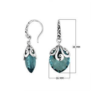 Sterling silver London Blue Topaz Quartz earrings with faceted teardrop design and ornate silver scrollwork for wholesale collection.