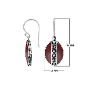 Sterling silver Red Coral oval earrings with floral silver center band for wholesale jewelry collection.