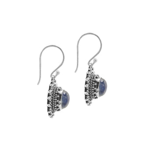 Wholesale sterling silver Bali granulated earrings featuring oval rainbow moonstone cabochons with polished–oxidized detailing, crafted to elevate artisan-inspired wholesale jewelry assortments with traditional handcrafted beauty.